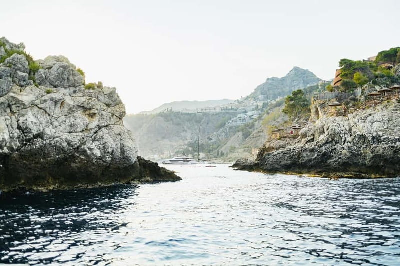 Taormina: Sunset Boat Tour with Dolphin Watching & Aperitif - Blue Diamond Boat Comfort and the Benefit of a Small Group