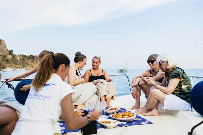 Taormina: Sunset Boat Tour with Dolphin Watching & Aperitif - Languages, Crew Style, and What Graziella Adds