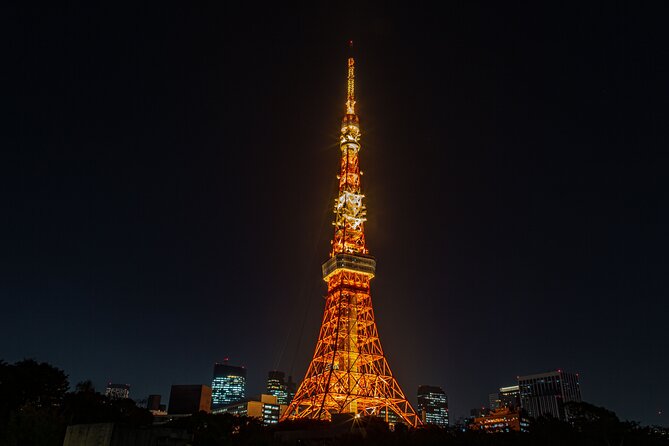 Tokyo Night E-Bike Tour with Tokyo Tower and Dolphin Show - Azabujuban snack break: a local shop moment, 30 minutes