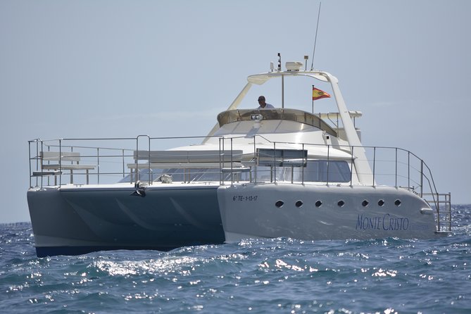 Whale and Dolphin Watching Catamaran with Transfer and Buffet - Starting from Puerto Colón: boarding Monte Cristo Catamaran